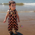 Juice Box Romper in Red Apple by Mabli