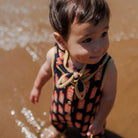 Juice Box Romper in Red Apple by Mabli