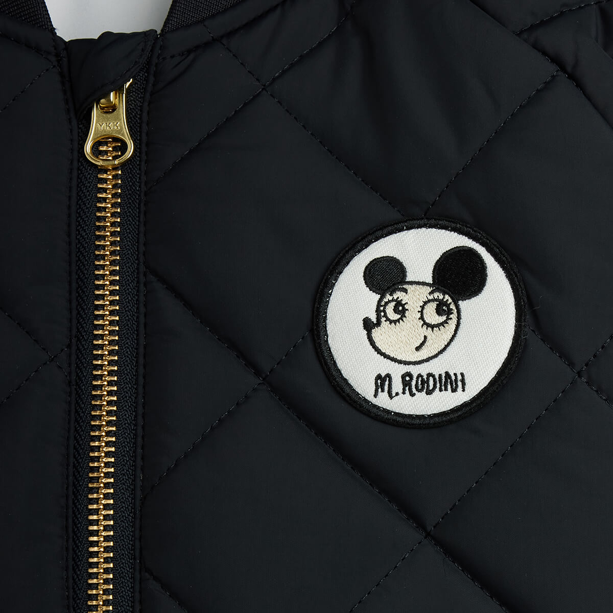 Ritzratz Patch Quilted Puffer Jacket in Black by Mini Rodini