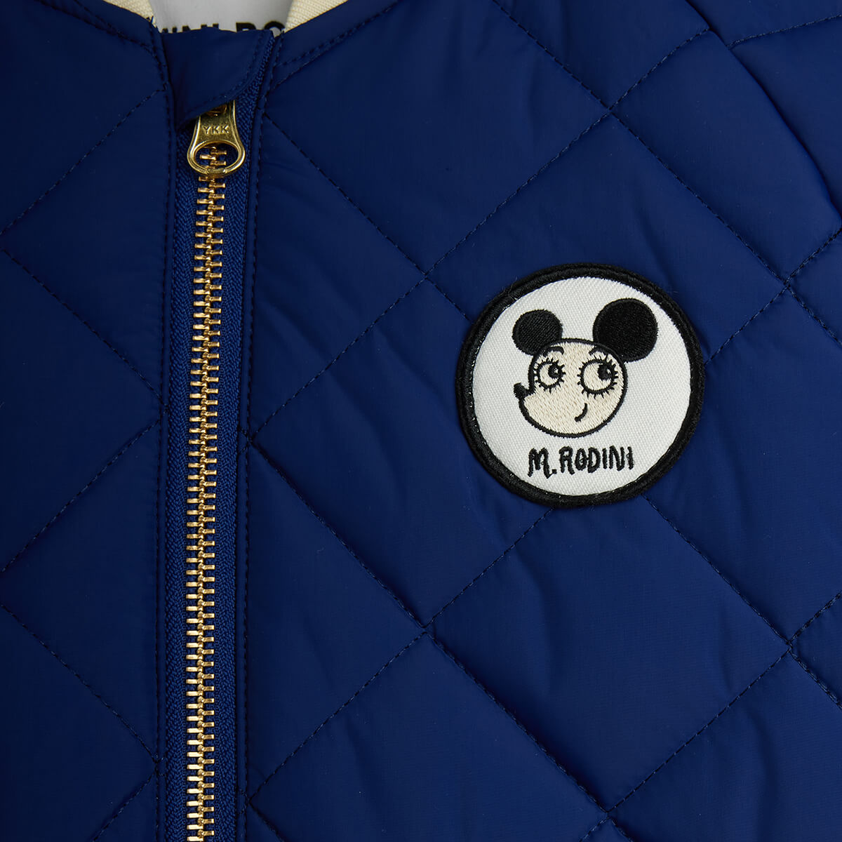 Ritzratz Patch Quilted Puffer Jacket in Blue by Mini Rodini