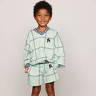 Check AOP Panther Patch Sweatshorts by Mini Rodini