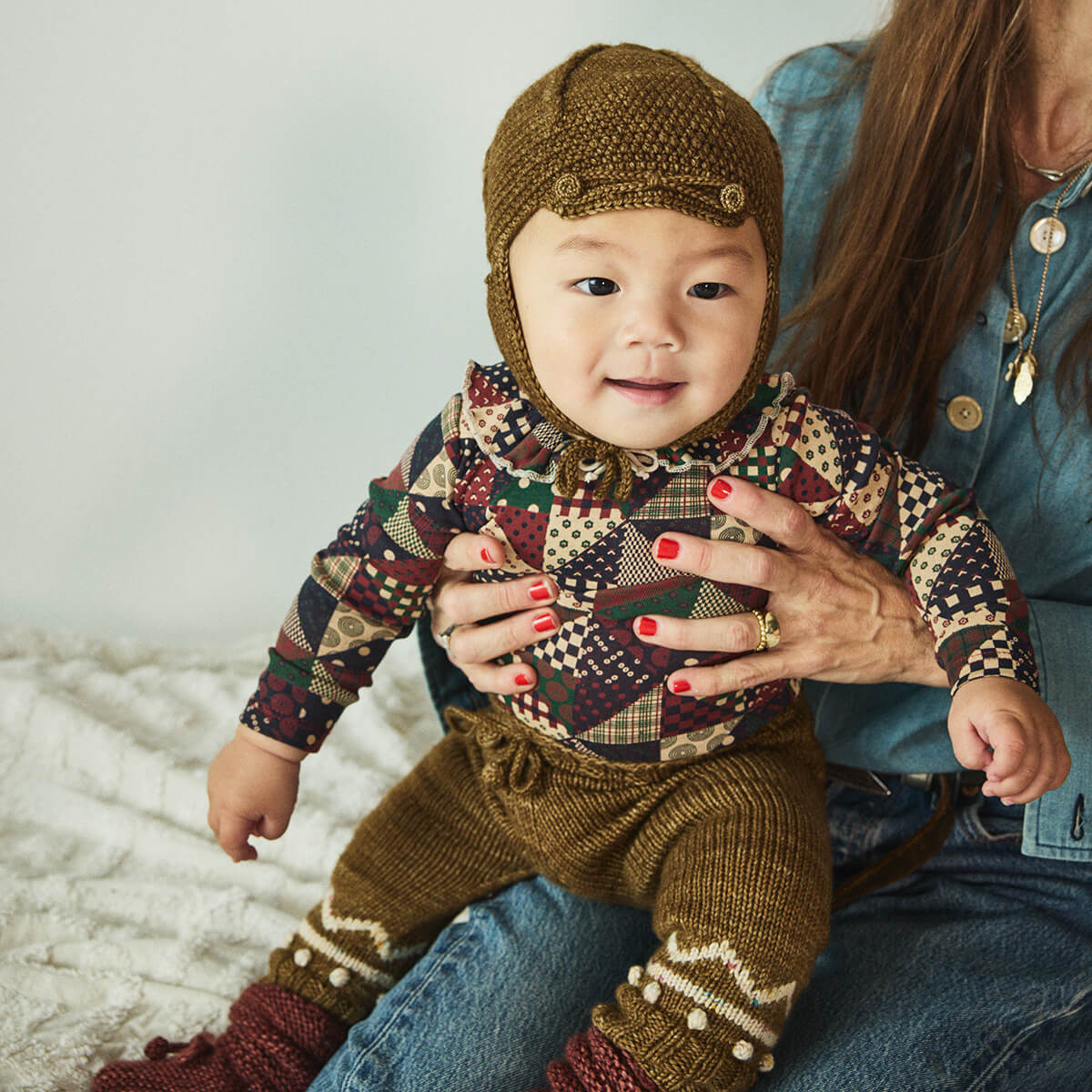 Baby Pattie Onesie in Madder Root Patchwork by Misha & Puff