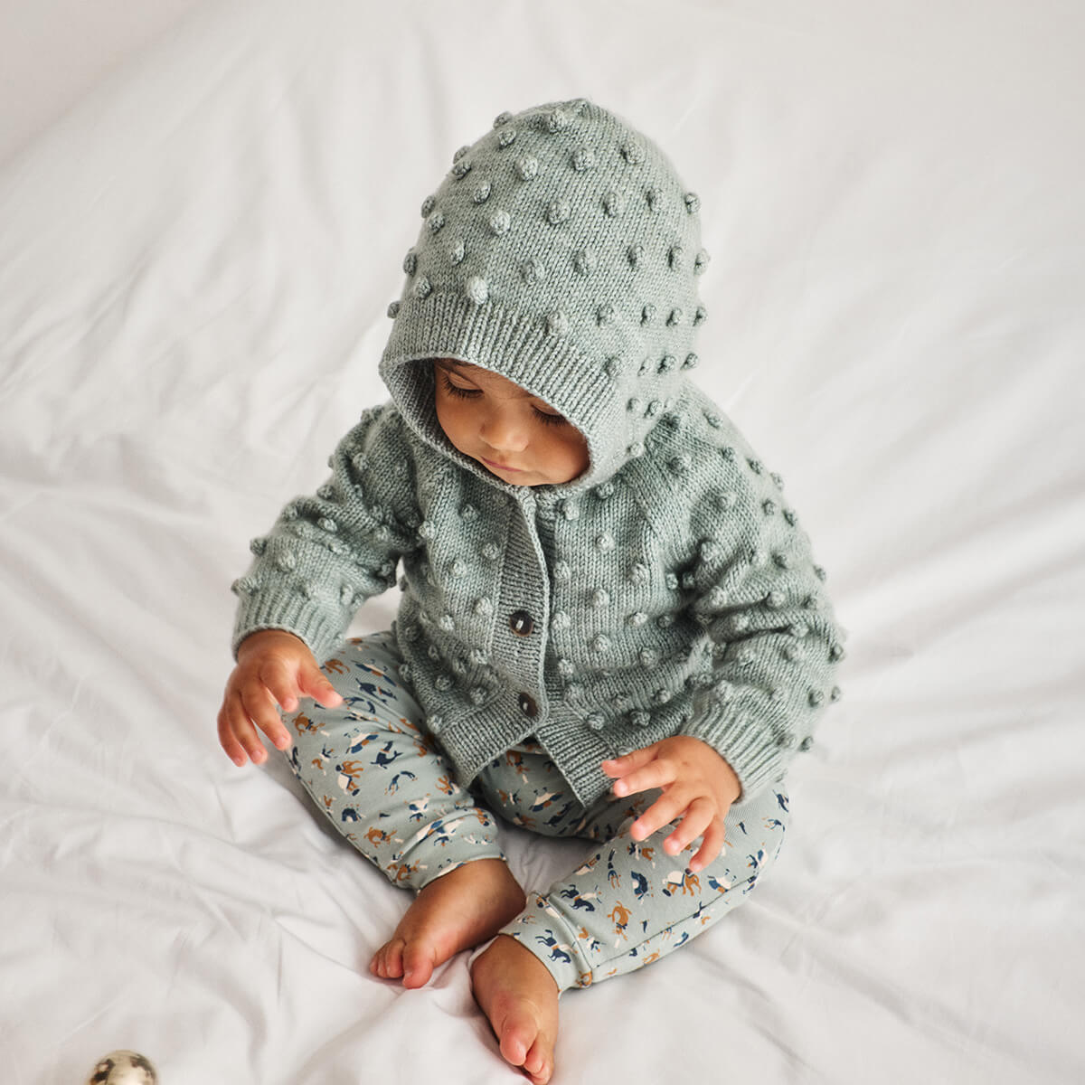 Baby Hooded Popcorn Cardigan in Onsen by Misha & Puff