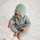 Baby Hooded Popcorn Cardigan in Onsen by Misha & Puff