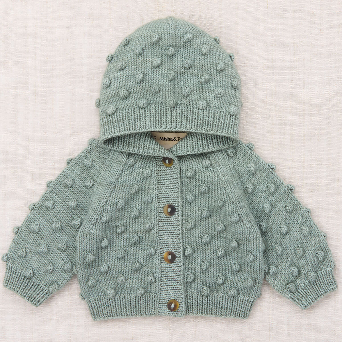 Baby Hooded Popcorn Cardigan in Onsen by Misha & Puff