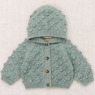 Baby Hooded Popcorn Cardigan in Onsen by Misha & Puff
