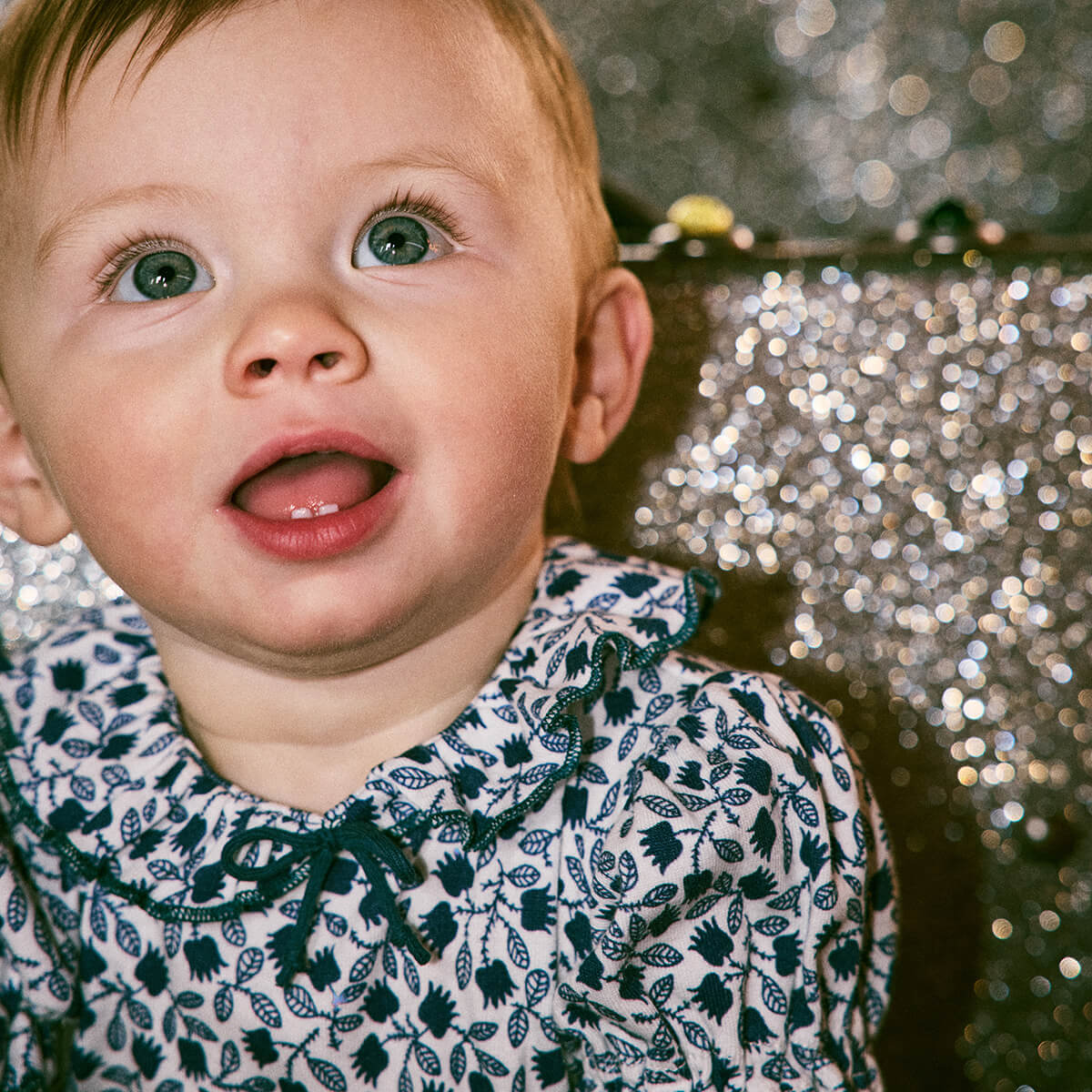 Baby Patricia Onesie in Blue Ribbon Lisse Fields by Misha & Puff
