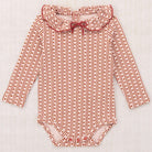 Baby Pattie Onesie in Candyfloss Little House Floral by Misha & Puff