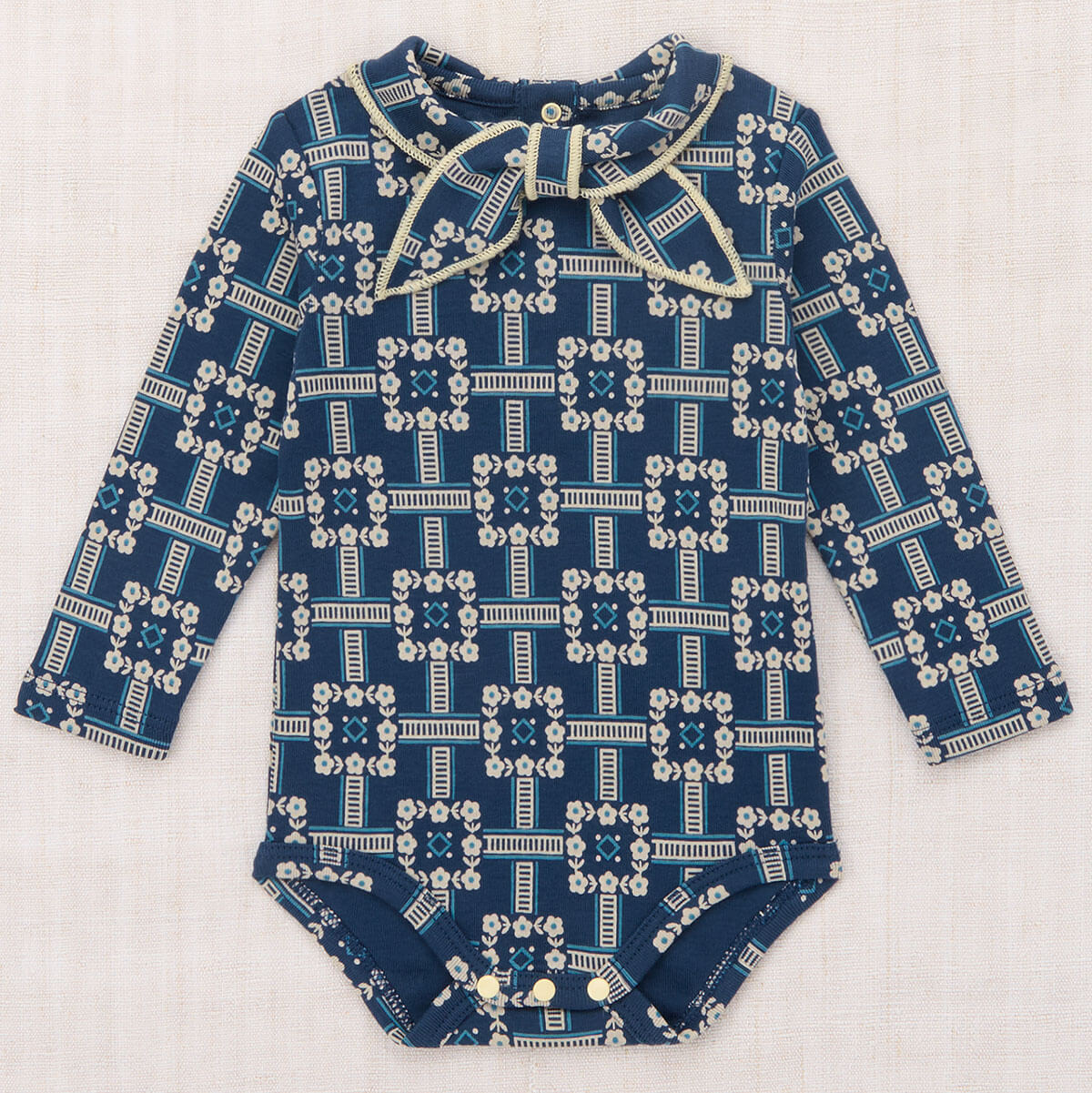 Baby Scout Onesie in Moonlight Railroad Floral by Misha & Puff