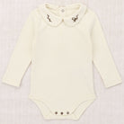 Baby Songbird Petit Collar Onesie in Winter Cream by Misha & Puff