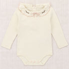 Baby Vinelet Pattie Onesie in Winter Cream by Misha & Puff