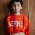 Cozydrop Sweater in Firecracker Red by Repose AMS