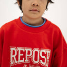 Cozydrop Sweater in Firecracker Red by Repose AMS