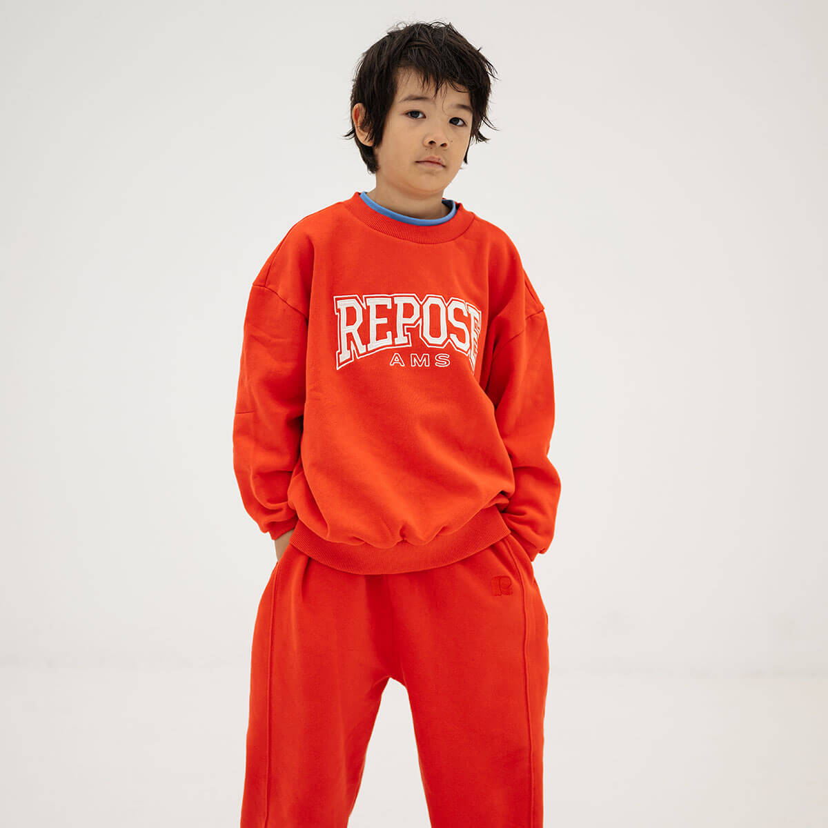 Cozydrop Sweater in Firecracker Red by Repose AMS