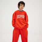 Cozydrop Sweater in Firecracker Red by Repose AMS
