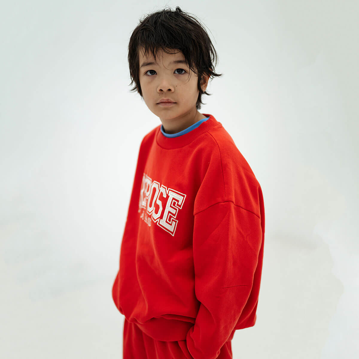Cozydrop Sweater in Firecracker Red by Repose AMS