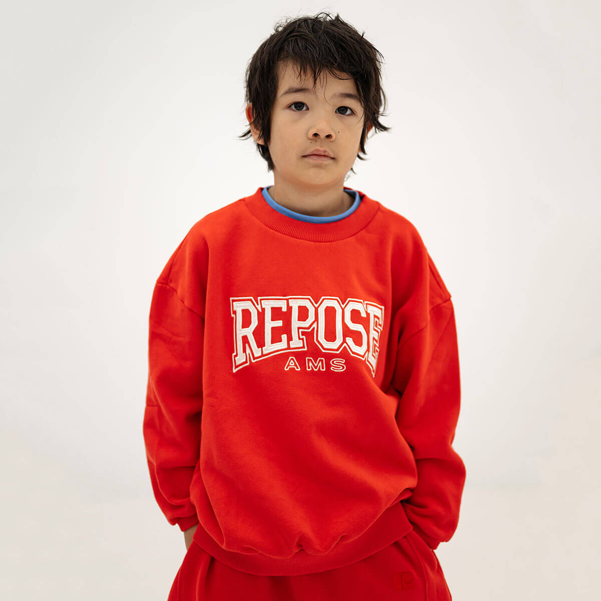 Cozydrop Sweater in Firecracker Red by Repose AMS