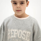 Cozydrop Sweater in Light Mixed Grey by Repose AMS