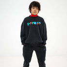 Cozydrop Sweater in Moonless Night Black by Repose AMS