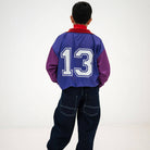 Sports Jersey in Orchid Pop Colour Block by Repose AMS