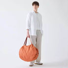 Compact Bag Size L in Brick Brown by Shupatto