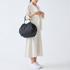 Compact Bag Size M in Jet Black by Shupatto