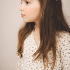 Crossover Tee in Calico Print / Powder by Soor Ploom