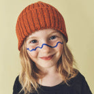 Aven Twisted Knit Beanie in Rust / Orange by Studio Koter