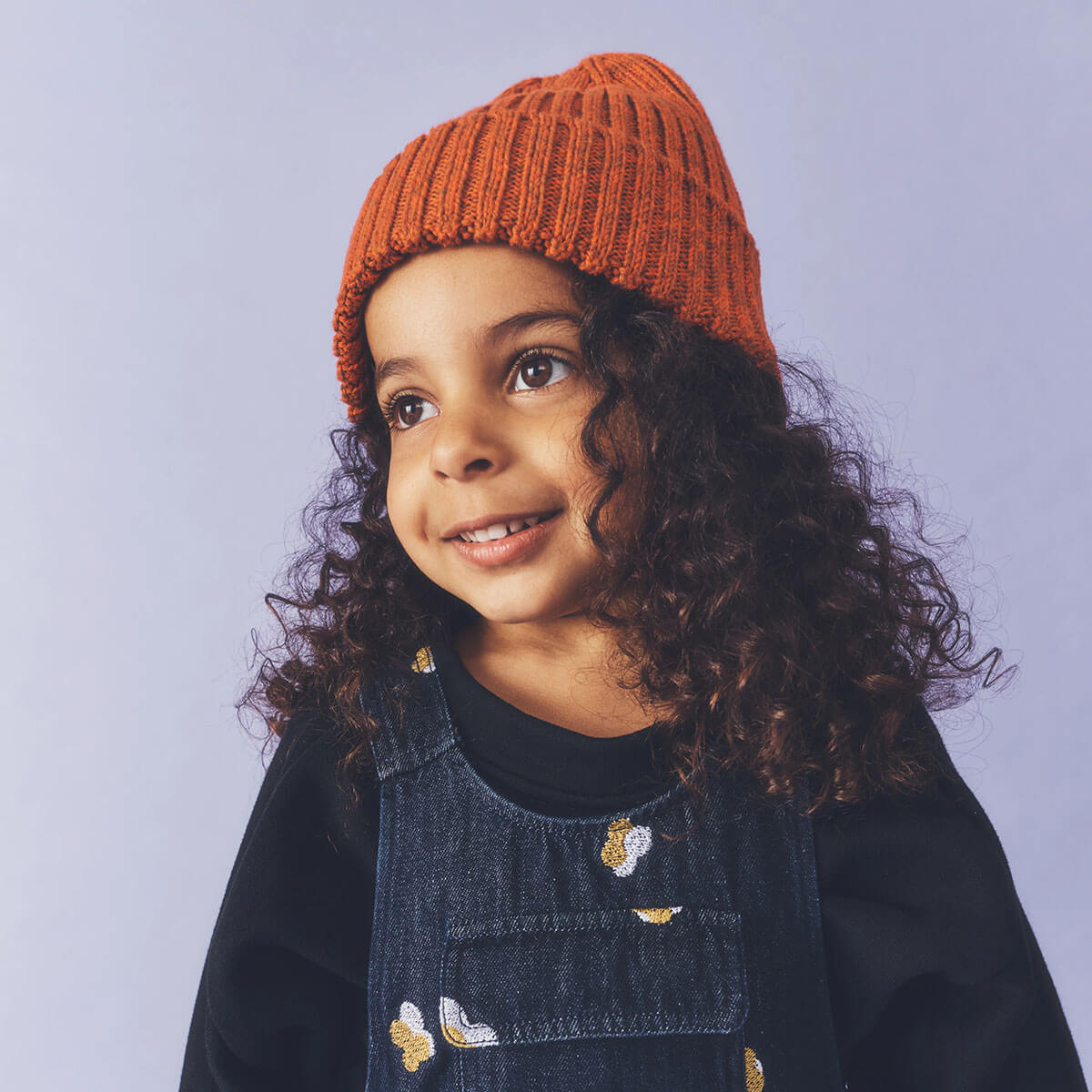 Aven Twisted Knit Beanie in Rust / Orange by Studio Koter