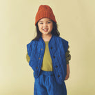 Aven Twisted Knit Beanie in Rust / Orange by Studio Koter