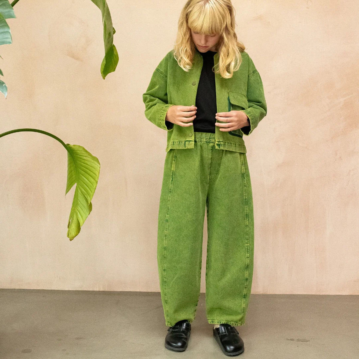 Manu Overdye Denim Trousers in Acid Green by Studio Koter