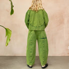 Manu Overdye Denim Trousers in Acid Green by Studio Koter