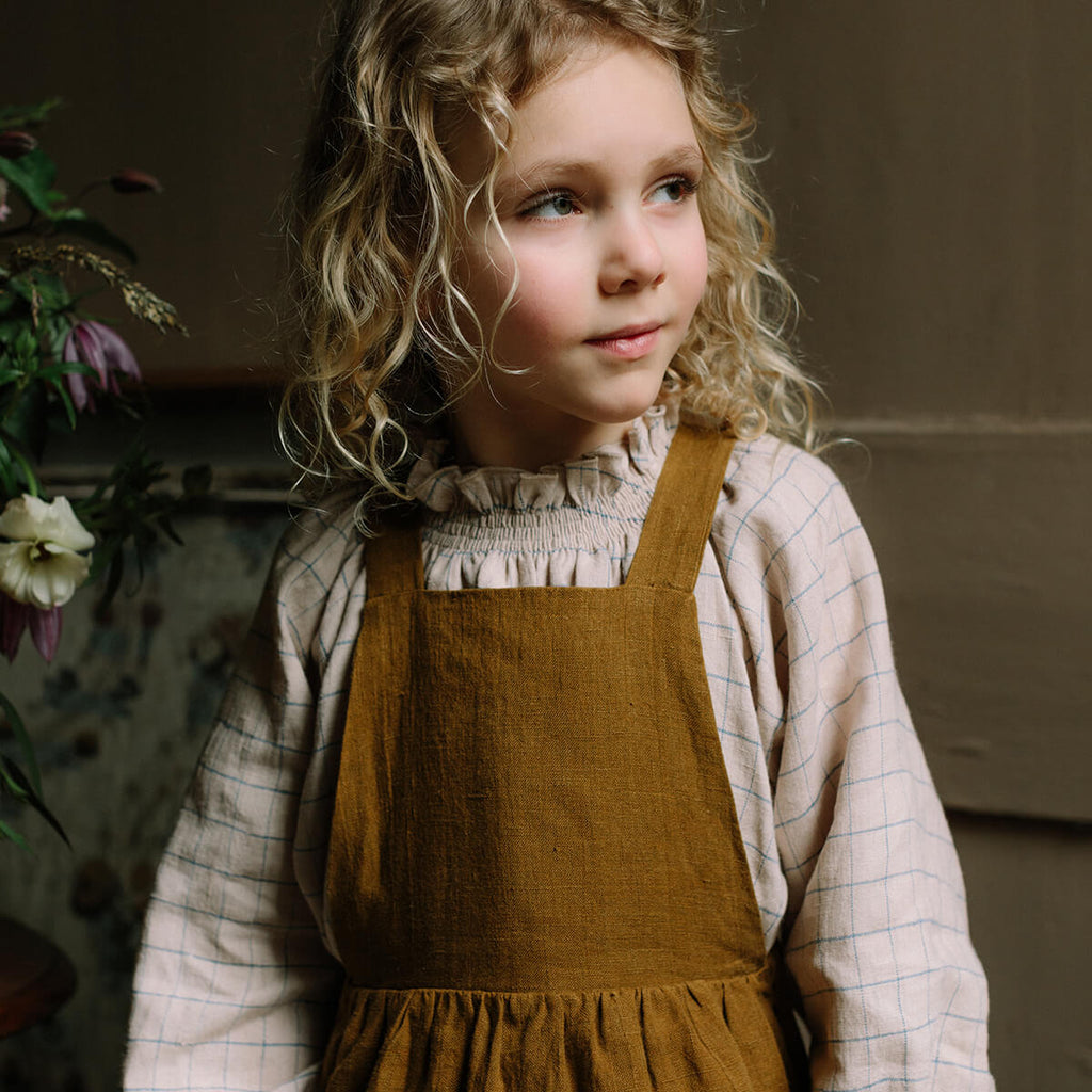 Conkers Pinafore in Burnt Caramel by Nellie Quats